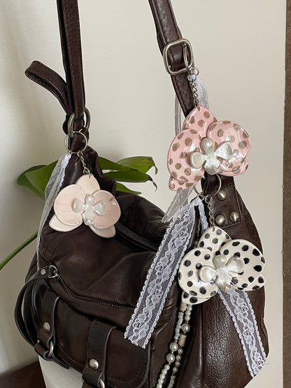 Charms mini orchidée rose